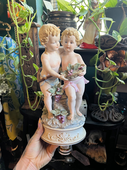 Bisque Porcelain Cherub Sculpture