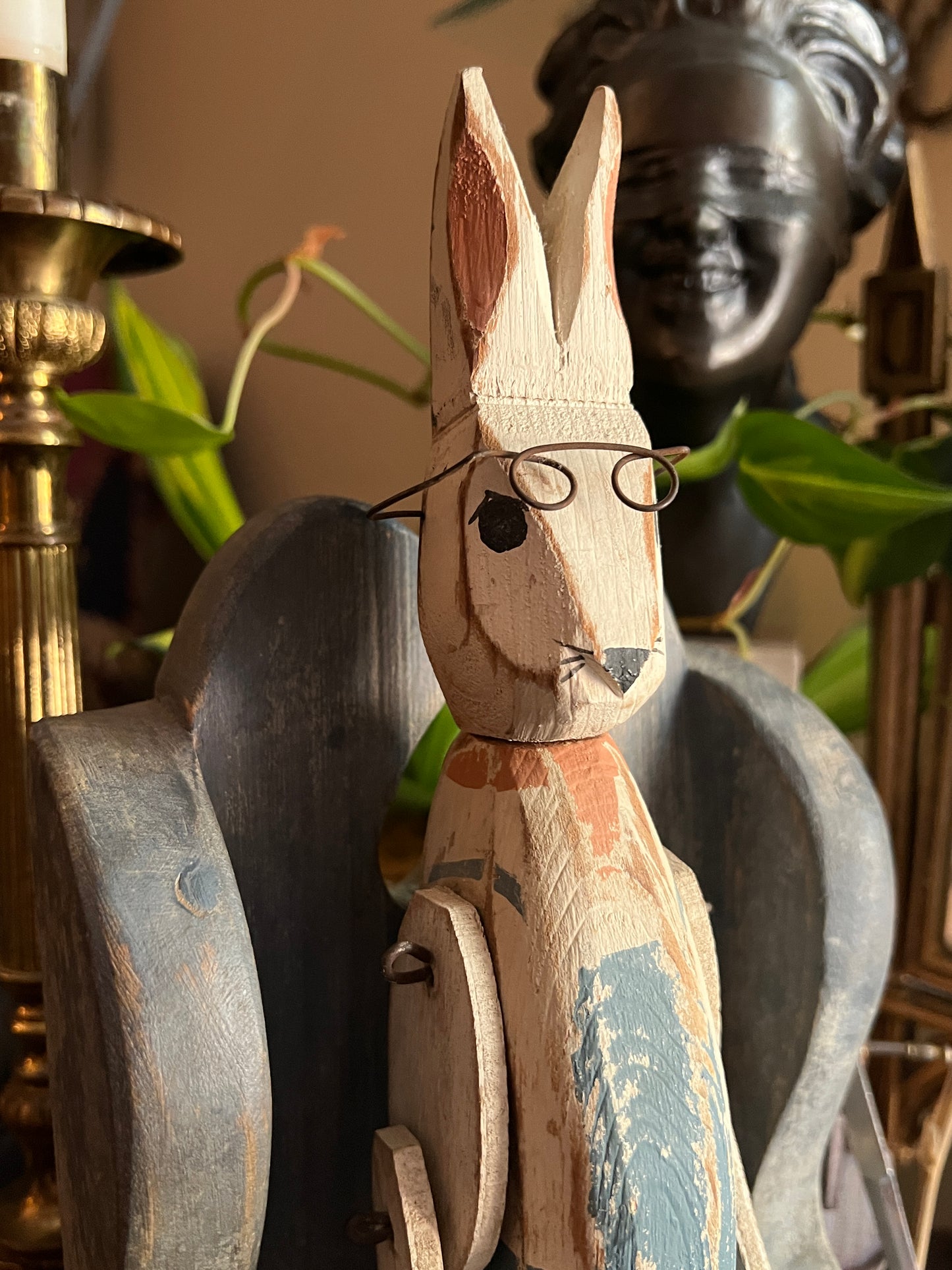 Hand-Carved Wooden Articulated Rabbit in Chair Figurine