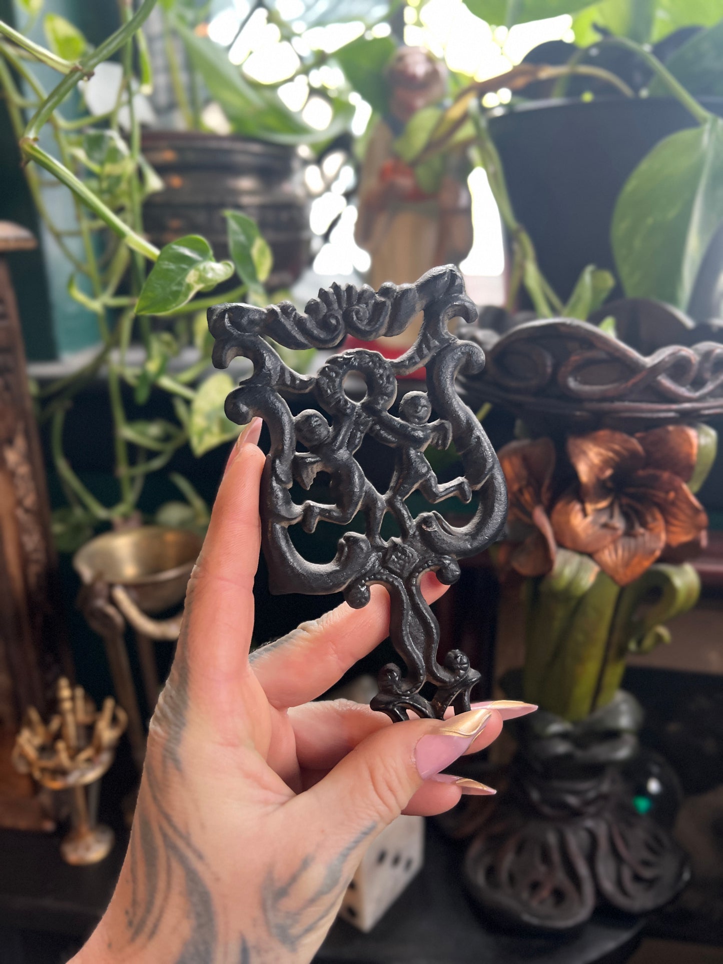 Miniature Cast Iron Cupid Trivet