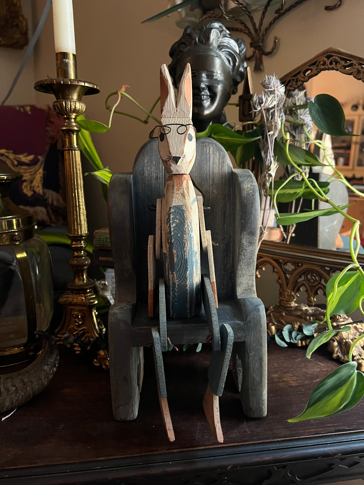 Hand-Carved Wooden Articulated Rabbit in Chair Figurine