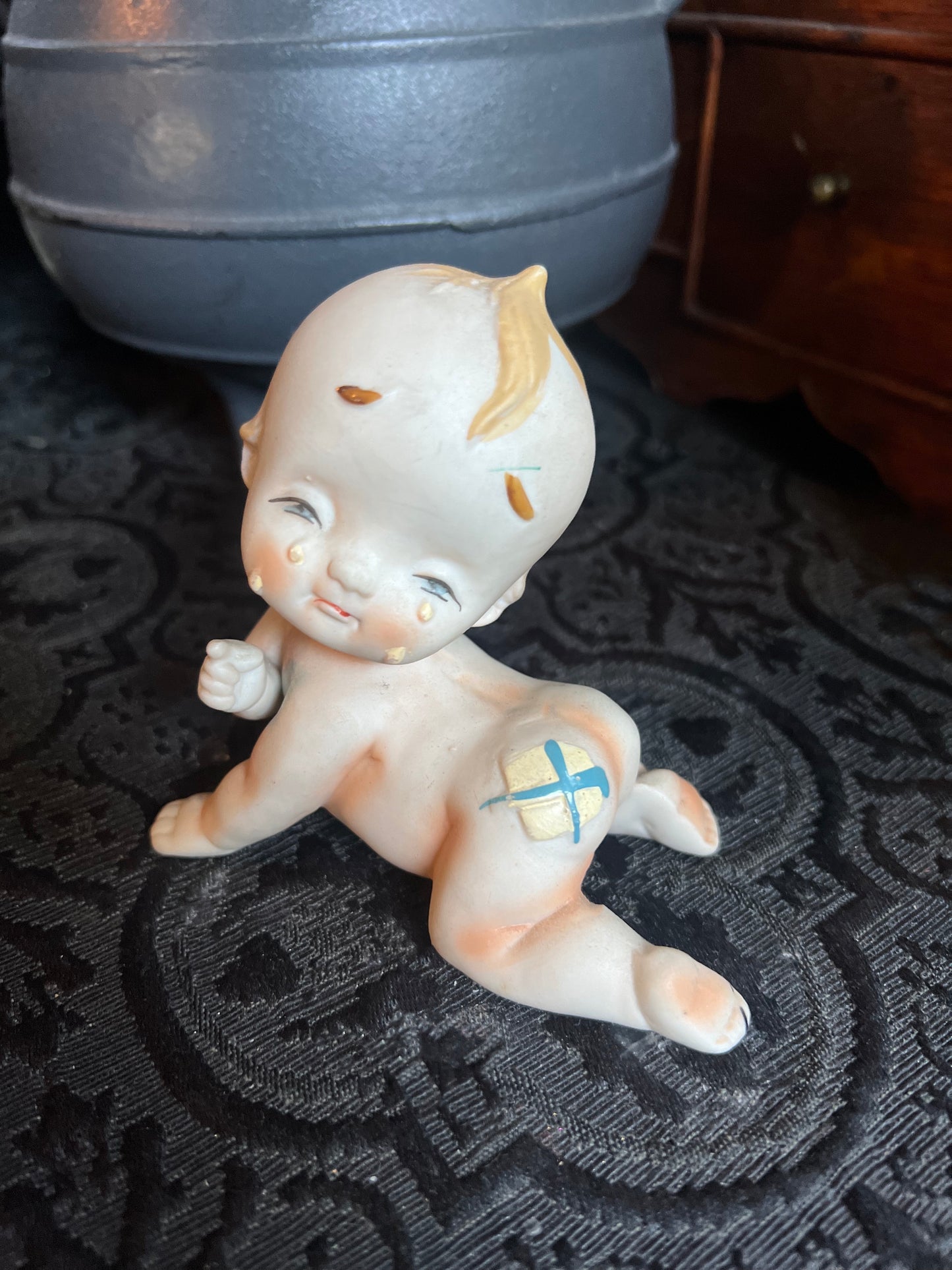 Crying Kewpie Figurine