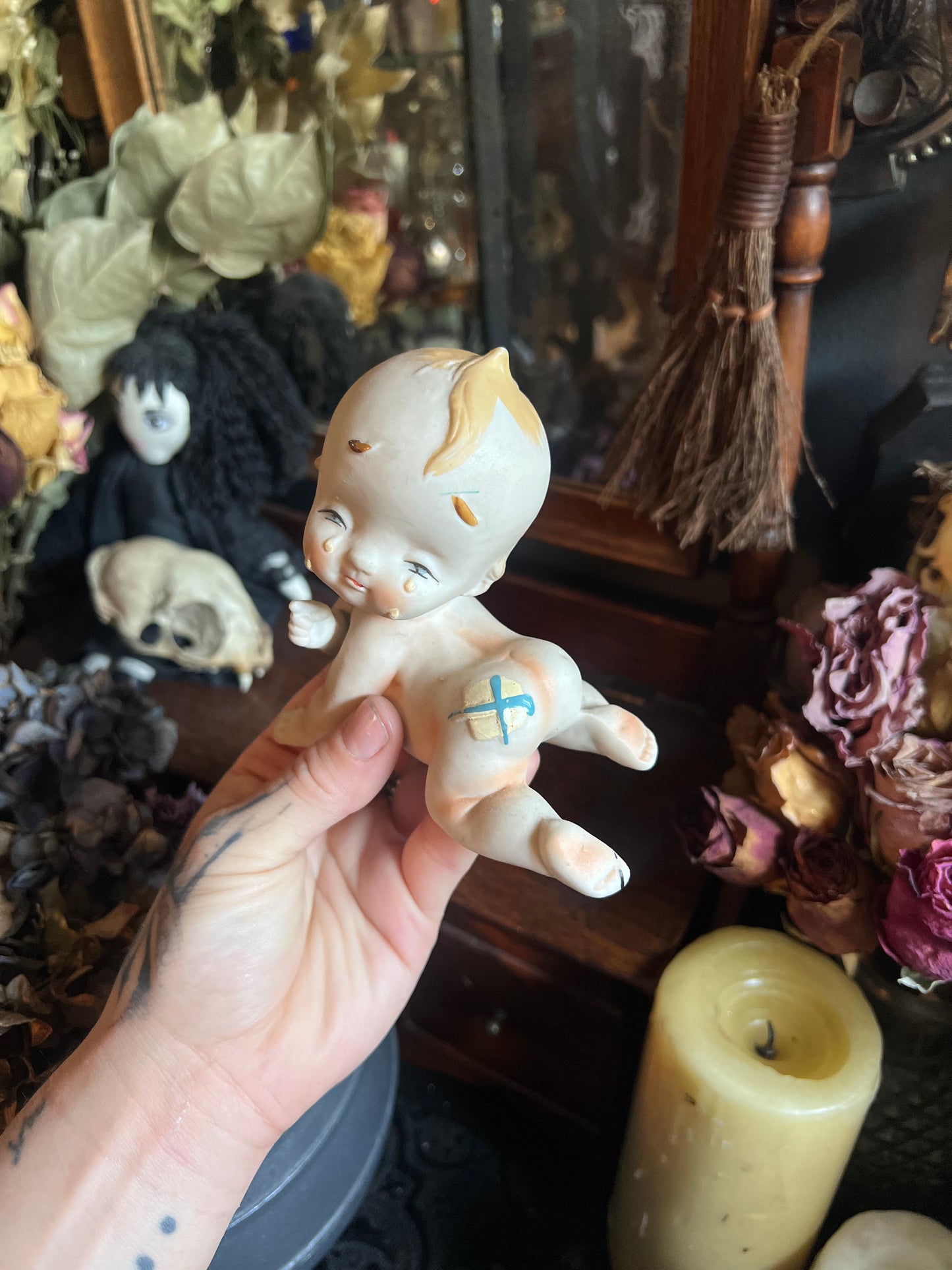 Crying Kewpie Figurine