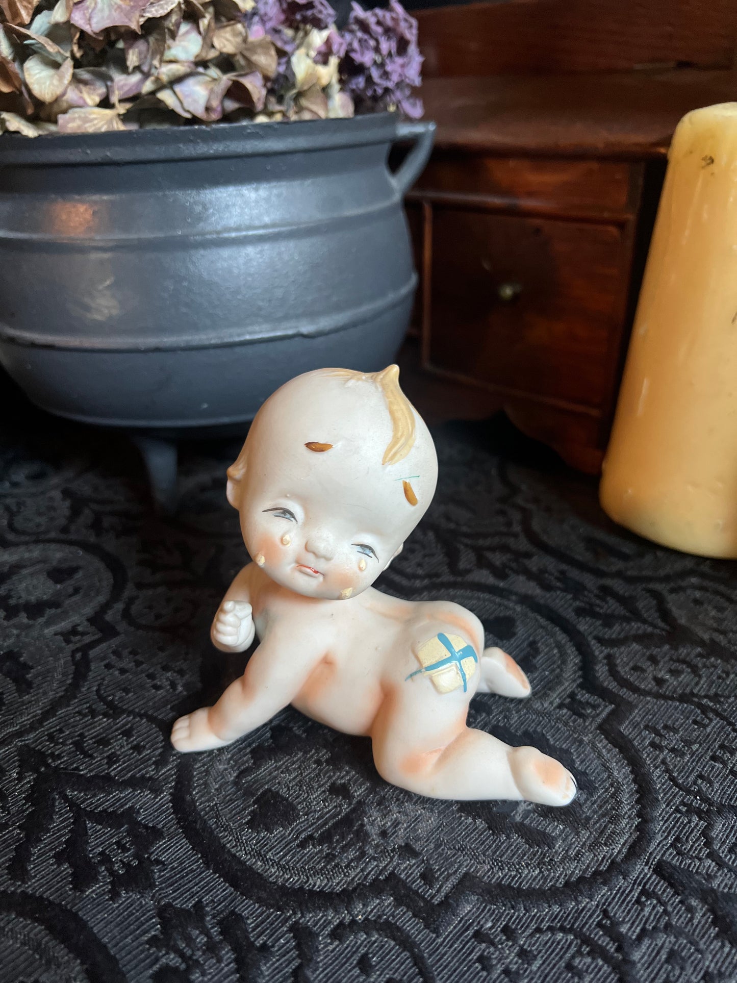 Crying Kewpie Figurine